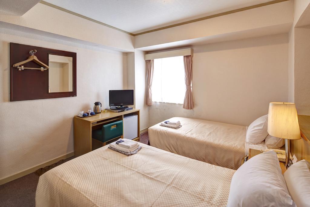 Okinawa Sun Plaza Hotel Naha Bagian luar foto