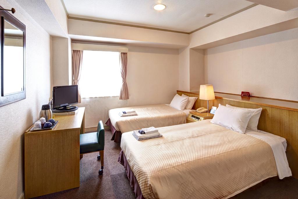 Okinawa Sun Plaza Hotel Naha Bagian luar foto